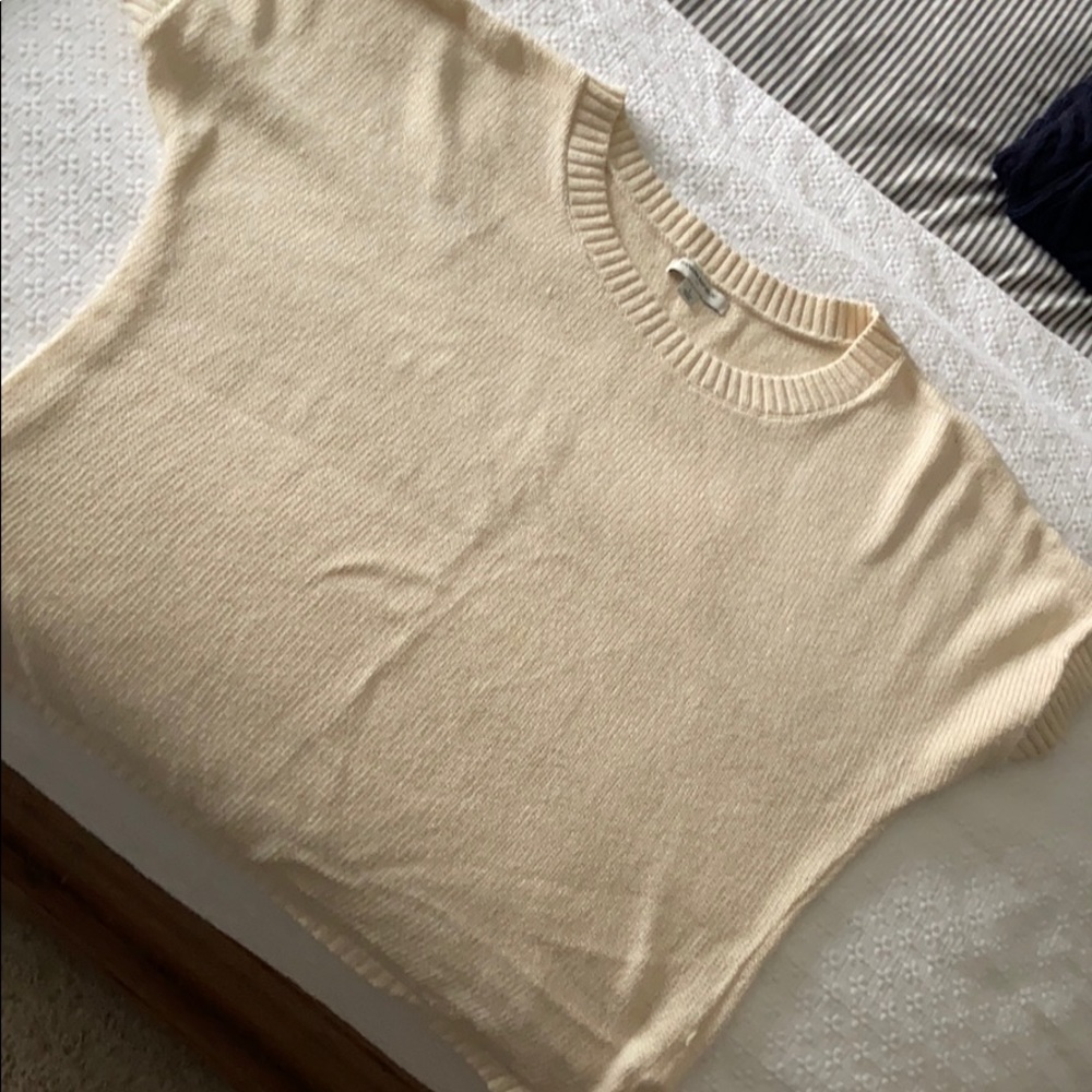 Cream colored shirt sleeve sweater